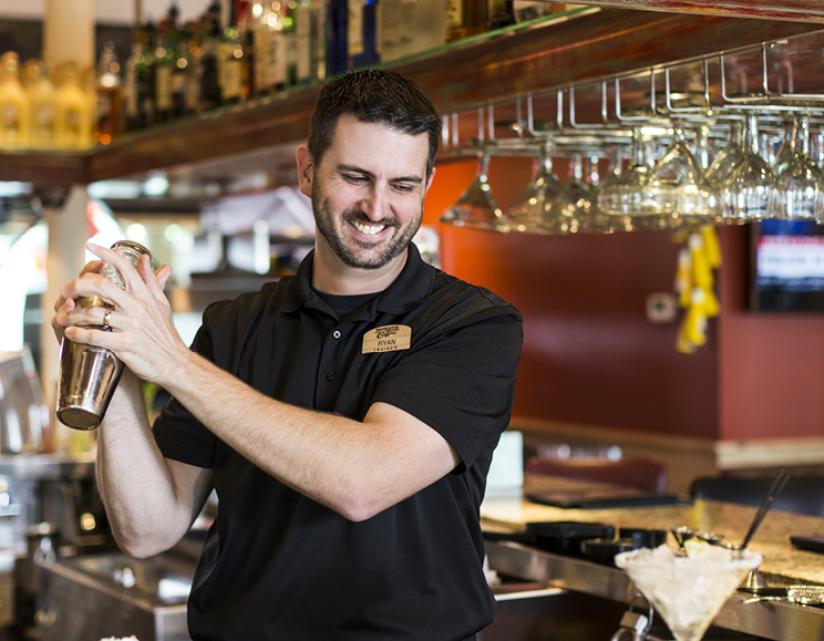 Bartender shaking drink